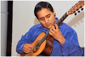 Fotografía de archivo de una interpretación de guitarra